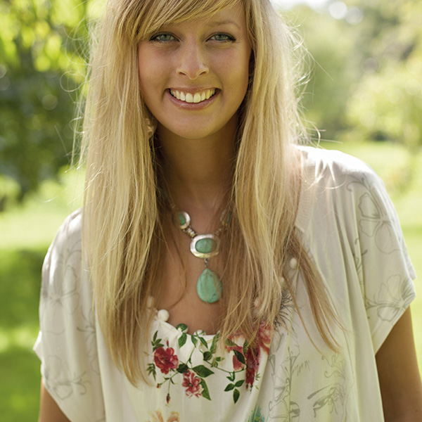 Blond woman in a graphic shirt