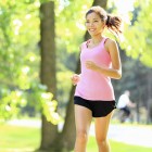 Runner - woman running in park