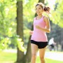 Runner - woman running in park