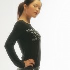 A beautiful Chinese model in a long sleeve graphic tee.